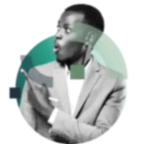 An African man pointing to the left with a surprised look on his face